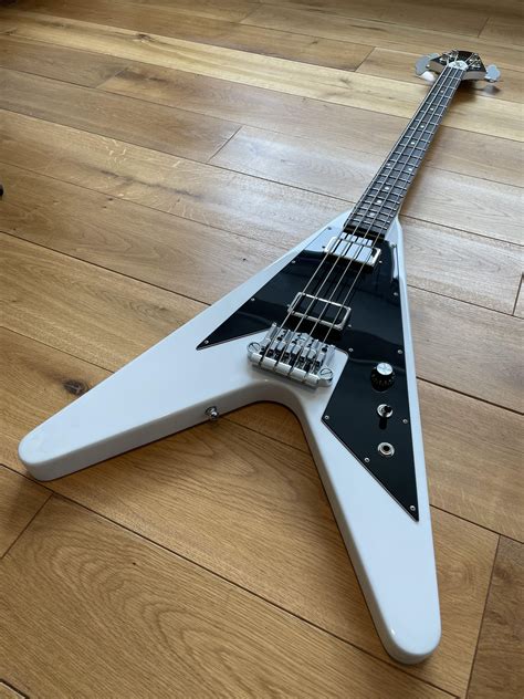 Flying v bass. These plans are based on the traditional Flying V Bass electric Bass guitar: 30.5” scale, SG Neck Pickup and SG Bridge Pickup (Small), Set neck, 3 Point Bass Bridge. If you need any variation of this bass guitar just let … 