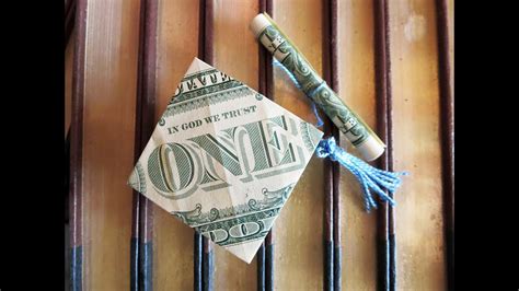 Fold money into graduation cap. Apr 24, 2021 - Explore Laurie Pinguelo's board "Dollar Bill Origami", followed by 235 people on Pinterest. See more ideas about dollar bill origami, origami, money origami. 