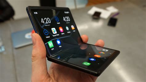 Folding phone. The biggest breakthrough since the mobile phone, Galaxy Fold introduced category-defying innovation that changed the shape of the phone — and the shape of the future. View product color and 360 degrees. Galaxy Fold. Space Silver Cosmos Black. slide1 slide2 slide3 slide4 slide5 slide6 slide7 slide8 slide9. 