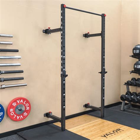 Folding squat rack. The PR-4100 is a folding wall-mount power rack that creates a functional workout space at home while taking up minimal space. The rack comes in two sizes: 21.5” deep (which folds in on itself to take up just 6” from the wall) and 41” (which folds left/right to take up 24” from the wall). This leaves plenty of space to park your car … 