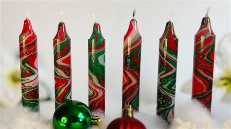 For a holiday craft that creates light, try making marbled candles by hand