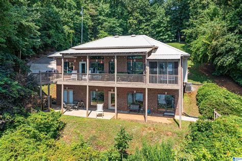 4 beds 4 baths 3,035 sq ft. 10715 Shoal Creek Rd, Ashville, AL 35953. ABOUT THIS HOME. Waterfront Home for sale in St. Clair County, AL: An absolutely beautiful home on Logan Martin Lake!! This house boasts 5 bedrooms/3 full baths and tons of storage space.. 