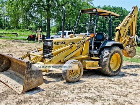 Ford 555d backhoe. The Ford 555D backhoe loader was manufactured from 1993 to 1995. The Ford 555D is powered by 256 cubic inches (4.2 L) 4-stroke 4-cylinder liquid-cooled diesel engine. The engine has a cylinder bore of 4.4" (112 mm), piston stroke of 4.21" (107 mm), rated power of 72 hp (53.7 kW), and maximum torque of 260 Nm (192 lb-ft) at 1200 rpm. 