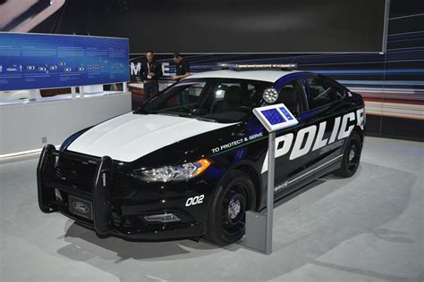 https://ts2.mm.bing.net/th?q=Ford%20Reveals%20First%20Pursuit%20Rated%20Hybrid%20Cop%20Car%20Based%20On%20The%20Fusion%20CarBuzz