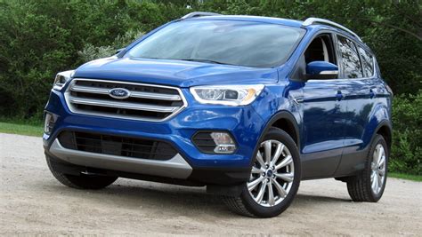 Ford escape car. May 23, 2012 · Compared with the previous, truck-like Escape, the new SUV is a bit lower, permitting Ford designers to sculpt a much more appealing body, more in line with the firm's current car range. 