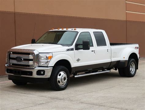 Ford f350 lariat diesel for sale. Mileage: 109,190 miles Color: Gray Body Style: Pickup Engine: 8 Cyl 6.0 L Transmission: Automatic. Description: Used 2006 Ford F-350 Lariat with Four-Wheel Drive, Running Boards, Leather Seats, Trailer Wiring, Keyless Entry, Spare Tire, Fog Lights, 17 Inch Wheels, Sliding Rear Window, Tow Hooks, and Front Bench Seat. 