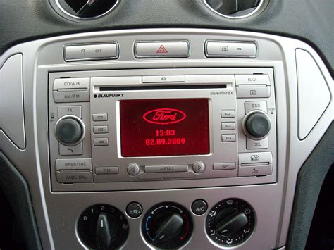 Ford mondeo 2001 audio system user manual. - Cat 740 operator and maintenance manual.