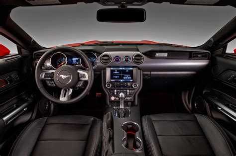 Ford mustang interior. The black and white interior features Oxford White leather seat inserts front and rear, plus Oxford White leather door panels. An aluminum appliqué on the dash … 