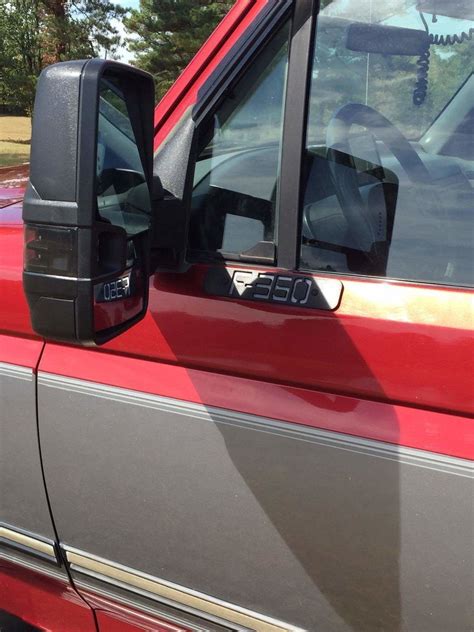 We chose this mirror due to its small and flat mounting base. Ford Super Duty tow mirrors have a much larger mounting base that is not flat, they cover almost the entire wing window and we do not recommend using them on these OBS Ford trucks.*** #obssolutions #obsford #builtinthepnw #visibilitymatters #ford #fordtrucks #oregontrucks …. 