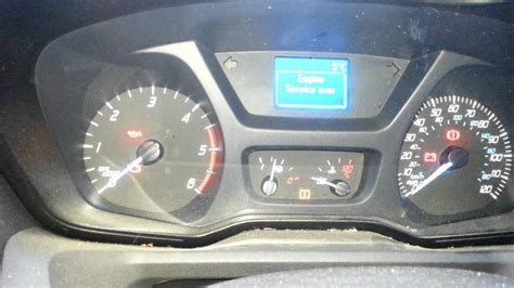 Ford transit service required message.  Message cleared with pressing The se...