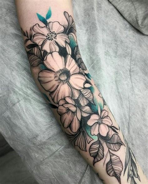 This beautiful forearm tattoo features a rose vine and a gem sword, symbolizing the search for true love. The pink shade of the rose adds a soft and graceful element to the design, while the shading adds just the right amount of soberness to it. 2. Rose, Heart, And Butterfly Tattoo. View this post on Instagram.. 