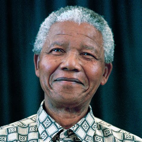 Former South African president Nelson Mandela places his hand …