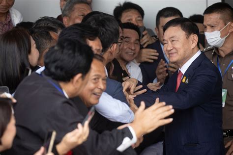 Former Thai PM Thaksin goes to jail as political party linked to him wins vote to take power
