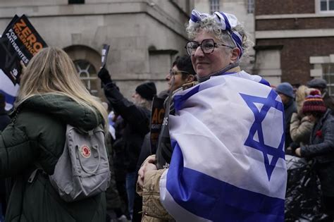 Former UK leader Boris Johnson joins thousands marching against antisemitism in London