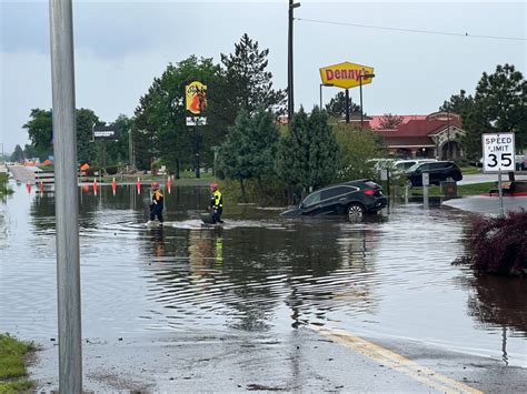 Fort Collins flooding strands hotel guests, damages cars