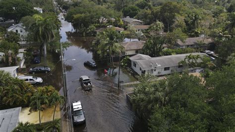 Fort Lauderdale faces chance of more rain Friday as devastating floods force hundreds of residents into emergency shelters