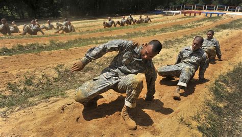 RMJ6ENCY – (FORT BENNING, Ga.) – U.S. Army Infantry soldiers-in-training assigned to Alpha Company, 1st Battalion, 19th Infantry Regiment, 198th Infantry Brigade, begin their first day of Infantry One Station Unit Training (OSUT) February 10, 2017 on Sand Hill. Some names obscured for personnel security. (Photo by Patrick A. Albright, Maneuver …. 