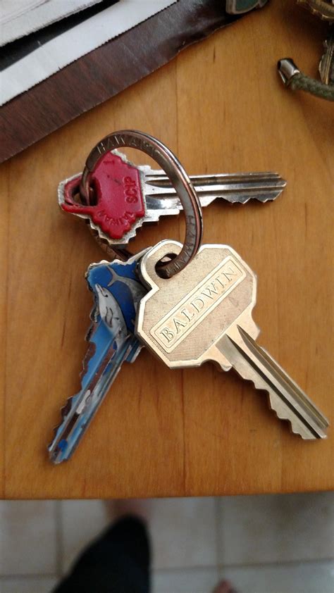 Found keys. How to Avoid Lost Keys. 1. " I attach a Tile to both sets of keys, and, just in case, I carry a spare car key and house key in my wallet.". - Kiki, Maryland. 2. "I put my keys on a big, colorful keychain and hang them on a storage hook, at eye level, by the front door. They go on the hook after arriving home.". - Michelle, Kansas. 