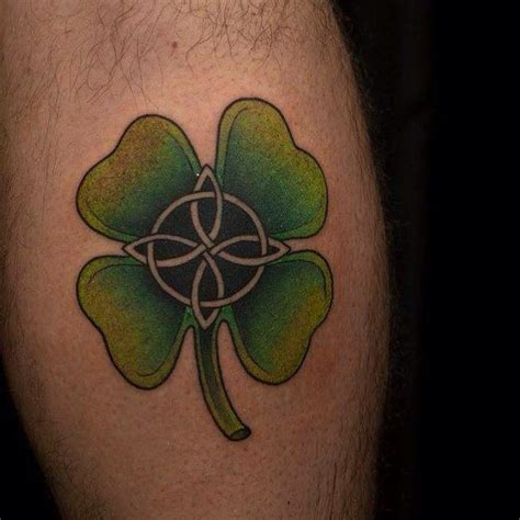 Four leaf clover tattoos for guys. Find inspiration for a realistic four leaf clover tattoo that symbolizes good luck. Discover top designs and get inked with a meaningful and beautiful symbol. 