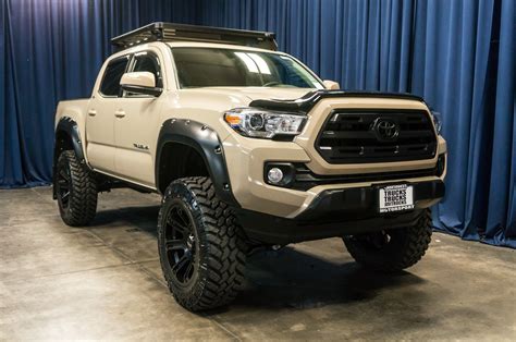Four wheel drive toyota tacoma. Heritage-inspired grille with Toyota bronze lettering ; 16-in. wheels with Bronze finish; 1.1-in. suspension lift (front) and 0.5-in. lift (rear) 