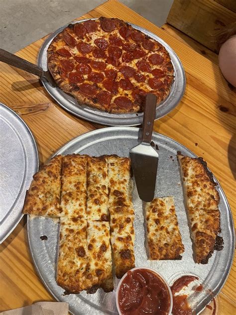 Best Pizza in Tupelo, MS - Vanelli's Bistro, Lost Pizza, Marco's Pizza, Pizza Doctor, PYRO'S Fire Fresh Pizza, Fox's Pizza Den, Tellini's Italiano, Papa Johns Pizza. 