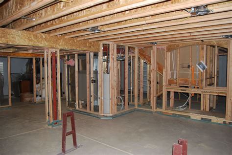Framing a basement. Align each stud with the 16-inch on-center marks made earlier. Secure the studs by nailing through the top and bottom plates and into the ends of the studs. Stand up the wall frame … 
