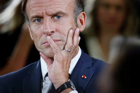 France’s Macron supports experimenting with uniforms in some schools amid debate over ban on robes