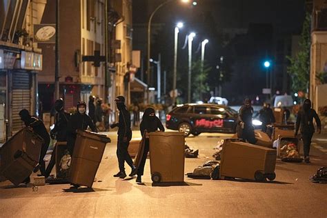 France arrests more than 1,300 people after fourth night of rioting over teen’s killing by police