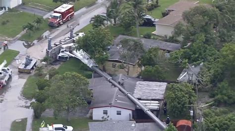 Franklin Fire Department responds after crane collapses onto home