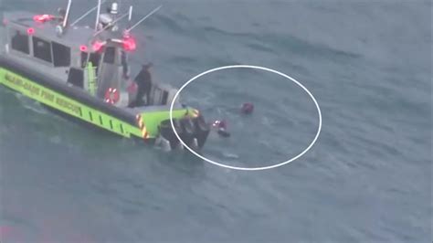 Frantic 911 call captures moments prior to rescue of 2 boaters stranded off Haulover Inlet