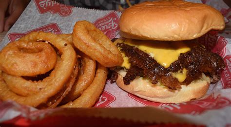 Freddies hamburgers. Jan 16, 2022 · For the most nutritious way to enjoy Freddy's frozen custard, order a single vanilla scoop in a dish. With no added cone, you'll save on carbohydrates and sugar. A single scoop of vanilla custard provides 350 calories, 17g fat, 10g saturated fat, 37g carbohydrates, 7g protein, 130mg sodium, and 30g sugars. A waffle cone provides just under 500 ... 