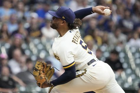 Freddy Peralta strikes out 13, allows only 1 hit as Brewers trounce Rockies 12-1