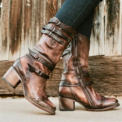 Freebirds boots. Description. In our signature style BAKER, statement making is inevitable. Its unique overlapped shaft showcases a front dip and strap details with adjustable silver … 
