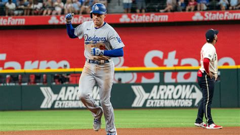 Freeman hits 2 of the Dodgers’ 5 HRs as they rout the Rangers 16-3 in matchup of division leaders