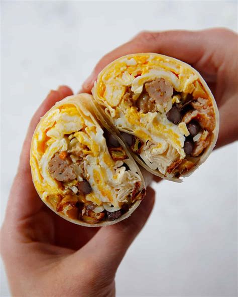 Freezer breakfast burritos. Whisk together eggs and milk, and cook. 3. Lay out a tortilla, add cheese followed by scrambled eggs and top with the potatoes and vegetables. 4. Tuck both ends of the tortilla and roll tightly. 5. Cover with aluminum foil and place into a plastic freezer bag. 