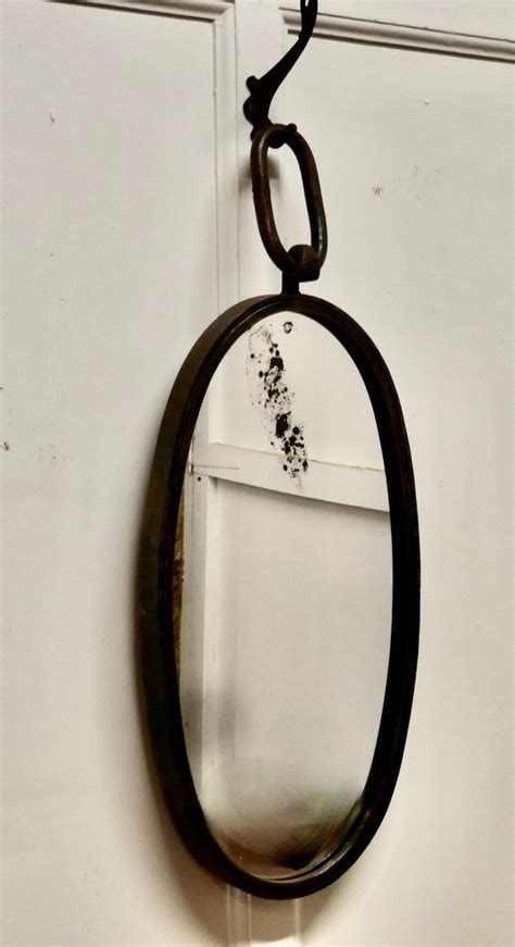 French Art Deco Brutalist Oval Iron Ships Mirror, 1920