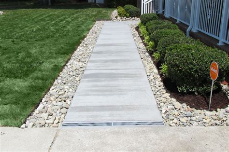 French drain landscaping. Modern French drain systems are made of perforated pipe, for example weeping tile surrounded by sand or gravel, and geotextile or landscaping textile. 