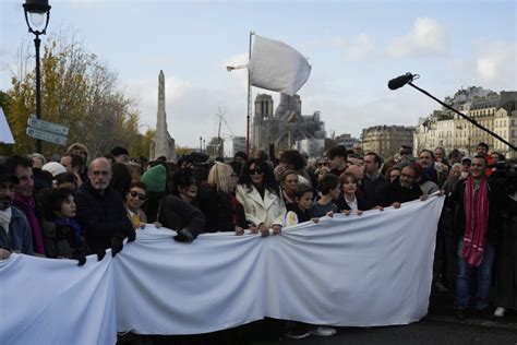 French performers lead a silent Paris march for peace between Israelis and Palestinians