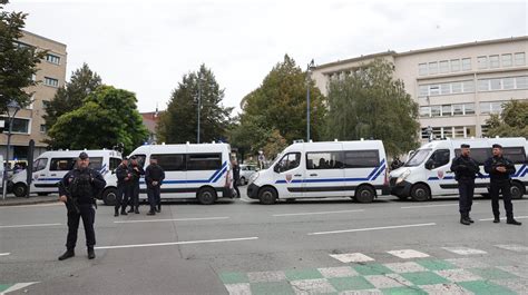 French police say a man killed a teacher and wounded 2 other people at a high school in the northern city of Arras