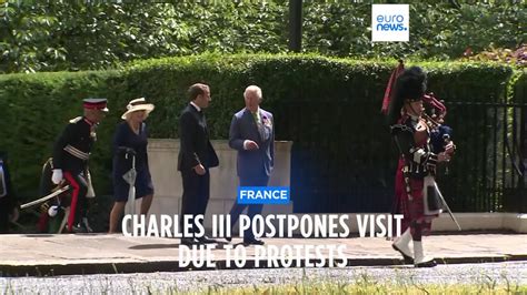 French president’s office says state visit by Britain’s King Charles III is postponed amid mass strikes and protests