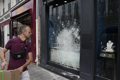 French president urges parents to keep teens at home to quell rioting spreading across France