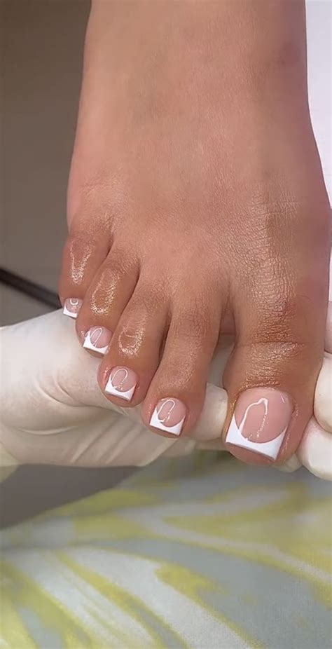 French tip toes nail polish.  Perfect your French tips with our simple, step-by-st...