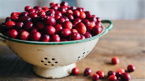 Fresh cranberries. Cranberries bounce over a 4-inch-high board when harvested, according to the Nantucket Conservation Foundation. Firm berries bounce, while the softer, overripe berries drop to the ... 