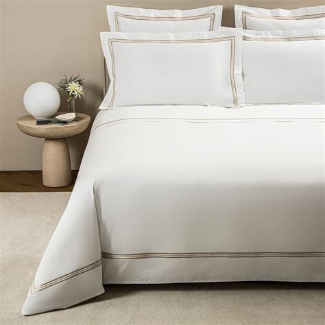Frette. Choose from a selection of cotton duvet covers, including cool and crisp percale, smooth and exceptionally soft poplin, and warm, silky cotton sateen. From minimalist to bold or classic to contemporary, Frette duvet covers are beautifully tailored with smart details like 3-line embroidery, Sicilian lace, or our signature double open hemstitch. 