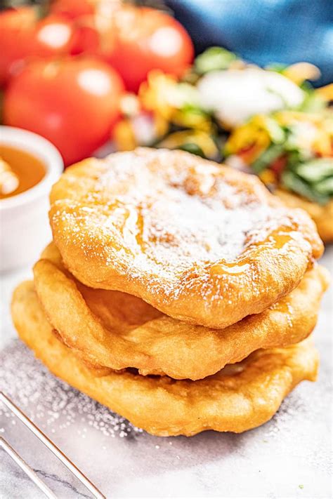 Fried indian bread. Navajo Indian Fry Bread has many names, depending on where you live and where the Indian Tribes are located. Some familiar names are Indian Fry Bread, Navajo Fry Bread, Navajo Tacos, and even Scones. The history of … 