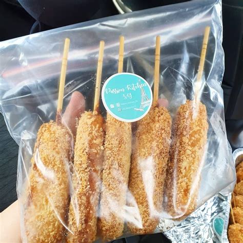 Frozen korean corn dogs. Preheat your air fryer to 400 degrees Fahrenheit for better results. Place the regular corn dogs or frozen mini corn dogs inside. You may also sprinkle some panko breadcrumb and cheese for added flavor. Reheat for 3-5 minutes or until golden brown. Remove and let it rest for at least 1-2 minutes. 