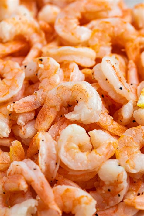 Frozen shrimp. Safely defrost shrimp in the refrigerator overnight. To expedite the process, submerge the airtight bag of frozen shrimp in a bowl of cold water until thawed. Avoid defrosting seafood and meat on the kitchen counter, where foodborne bacteria can multiply rapidly and cause illness. 