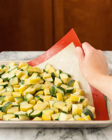 Frozen zucchini. Instructions. Spray the air fryer basket with cooking spray, or line the basket with a reusable silicone liner. Spread the frozen zucchini fries into the air fyrer basket, spray generously with cooking spray, and set the cooking time for 8-10 minutes at 400 degrees F. using the air fryer setting. Serve with your favorite dipping sauce. 