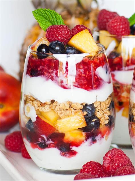 Fruit yogurt. How to Make Yogurt Parfait. Wash and dry the berries. Rinse and pat dry the blueberries and strawberries. Cut the strawberries into pieces. Layer the yogurt parfait. Layer the yogurt, strawberries, blueberries, and granola in a glass cup or mason jar. You can layer as much of each ingredient as you please, it’s up … 