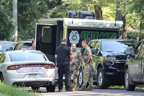Fugitive killer eludes Pennsylvania police for eighth day as wary residents keep a watchful eye